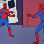 Two Spidermen pointing at each other